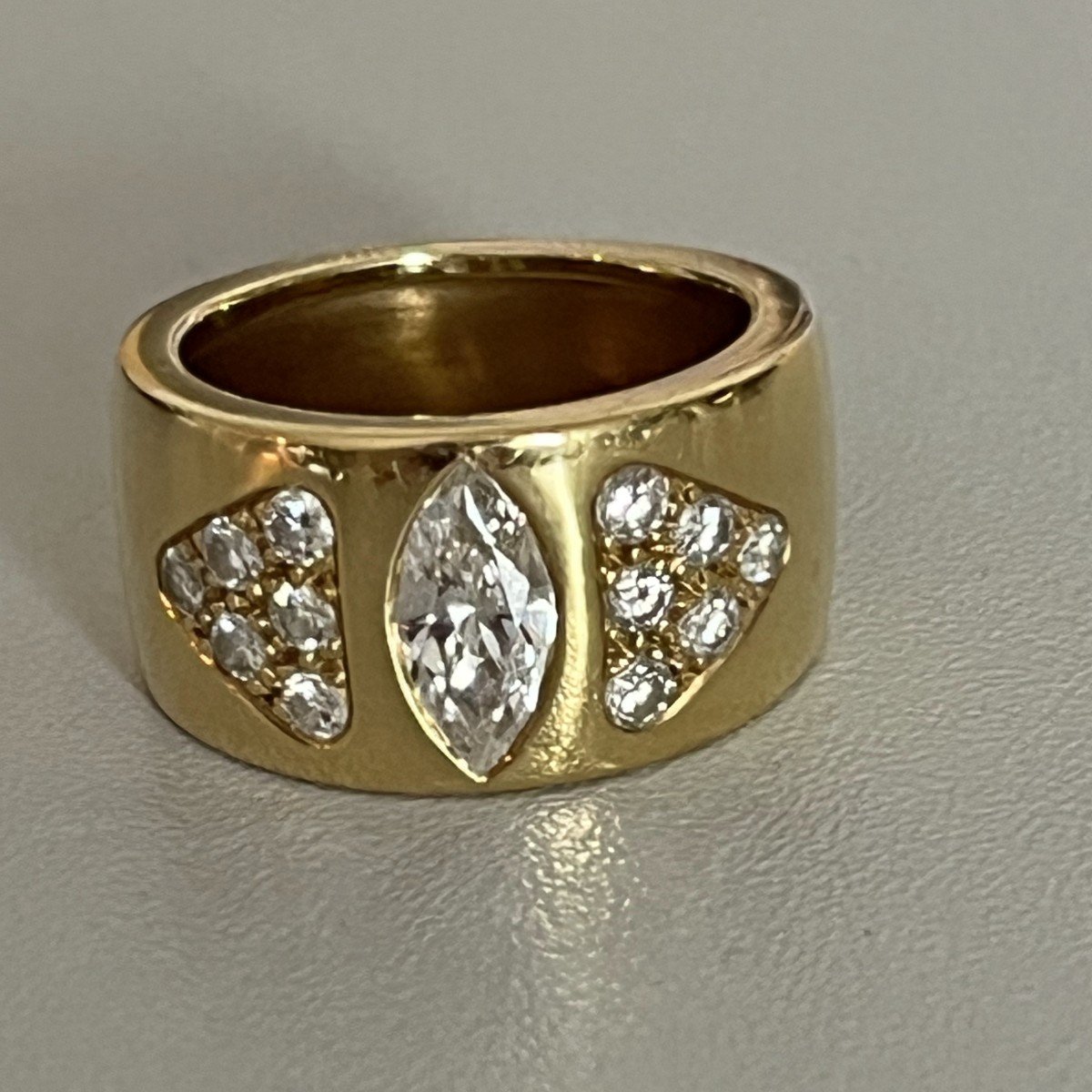 6196- Yellow Gold Diamond Band Ring (0.60 Ct In The Center)