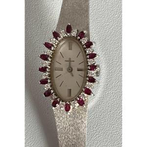 4150– Montre Dame Or Gris Diamants Rubis