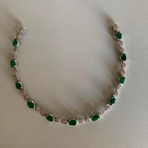 3200- White Gold Bracelet Emeralds Diamonds