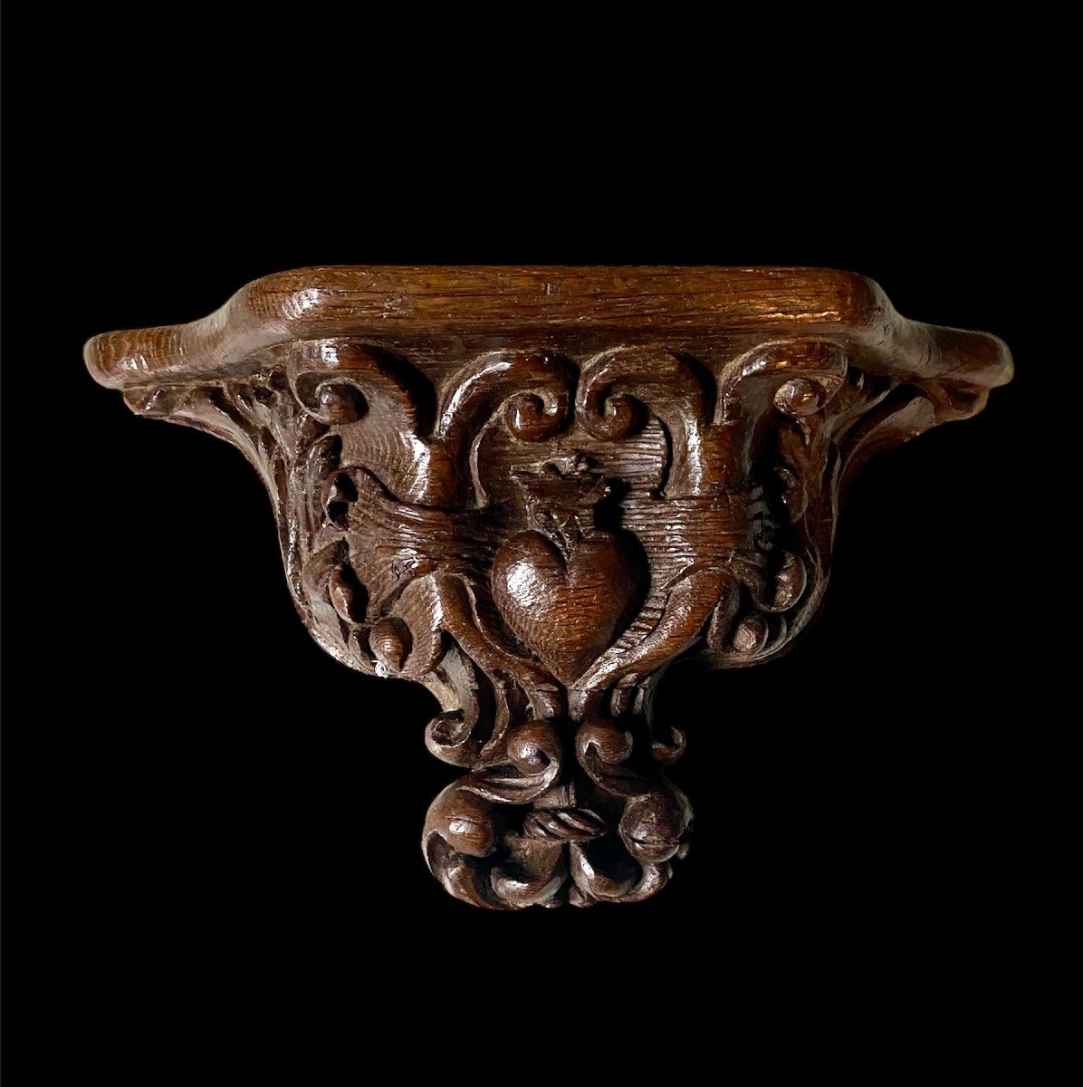 An Oak Mercy Seat Or Misericord With A Sacred Heart, Circa 1600