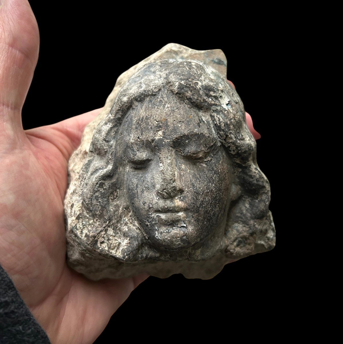 A Relief Fragment Of A Woman's Head, Circa 1500