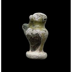 A Medieval Whistle In Green Glaze In The Form Of An Owl