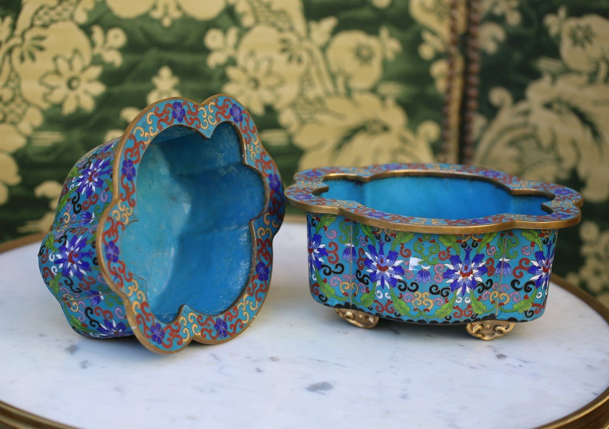 China Late 19th Early 20th Century Pair Of Small Cloisonné Enamel Planters On A Blue Background.