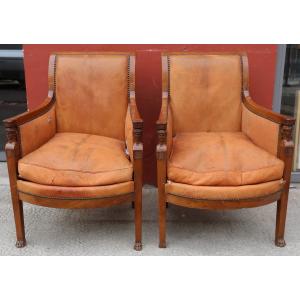 Pair Of Empire Period Mahogany Bergères With Reversed Backs.