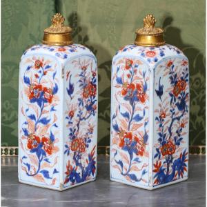 China Imari XVIII Pair Of Square Porcelain Bottles, Gilt Bronze Stoppers.