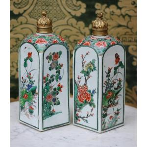 China Kangxi Period Pair Of Square Famille Verte Bottles, Later Gilt Bronze Stoppers.