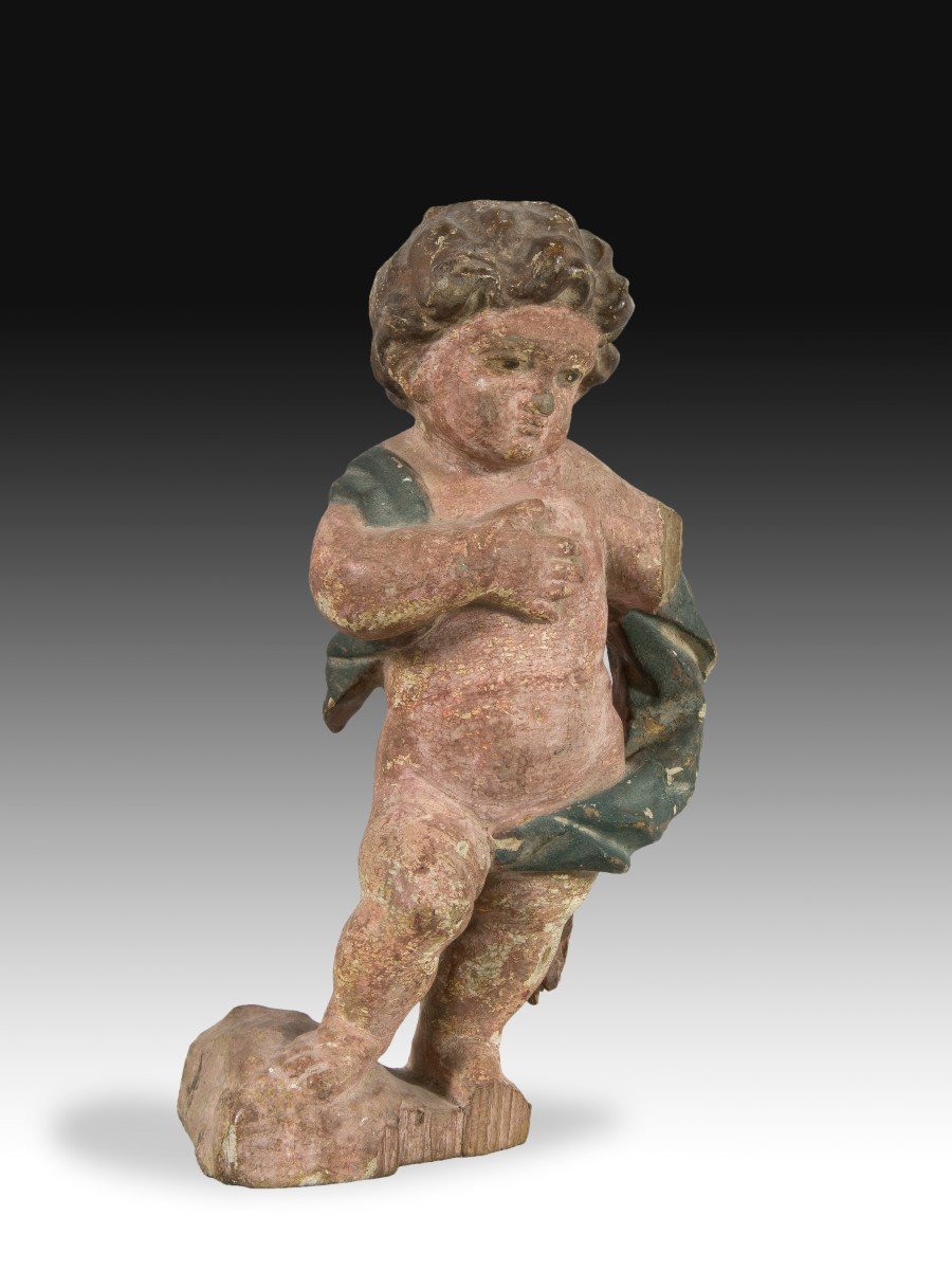 Enfant. Bois Sculpté Et Polychrome. XVIIe Siècle.