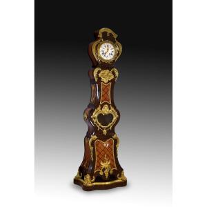 Clock. Palo Santo, Gilt Bronze... France, 19th Century, After Charles Cressent 