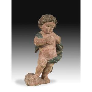 Enfant. Bois Sculpté Et Polychrome. XVIIe Siècle.